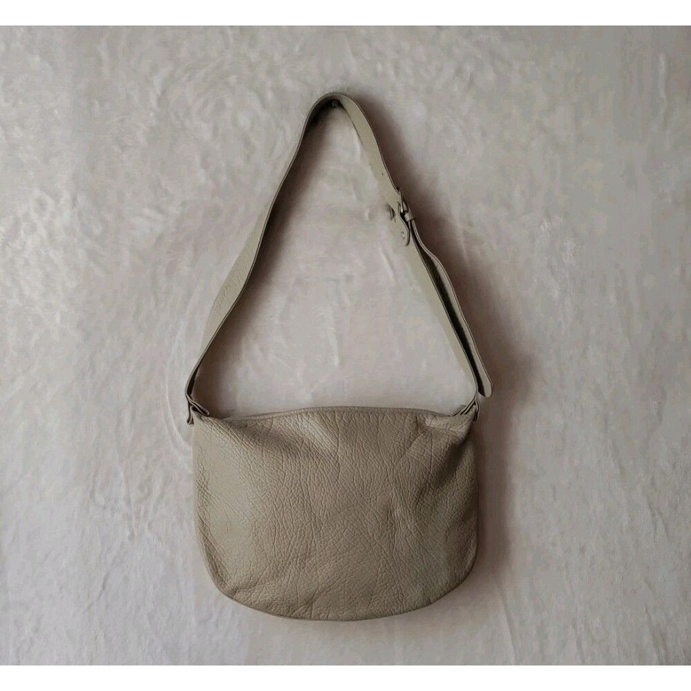 GROOM Paris Full Grain Leather Adjustable Strap Hobo Bag In Beige Minimalist
